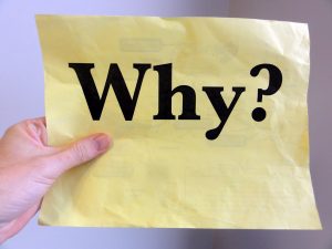 Yellow paper saying "Why?"